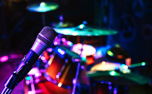 microphone in front of drum set
